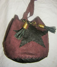 sac grand format sous forme de bourse bordeaux et noir étoile en cuir Sylvie G création